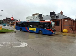 E200MMC 247 in a wet Wigan bus station this morning on loan to Go North West